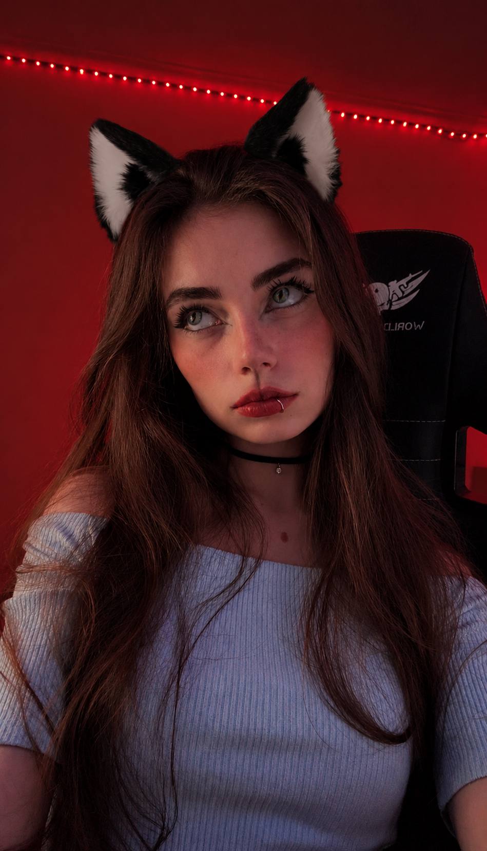 Diana wearing cat ears in her studio